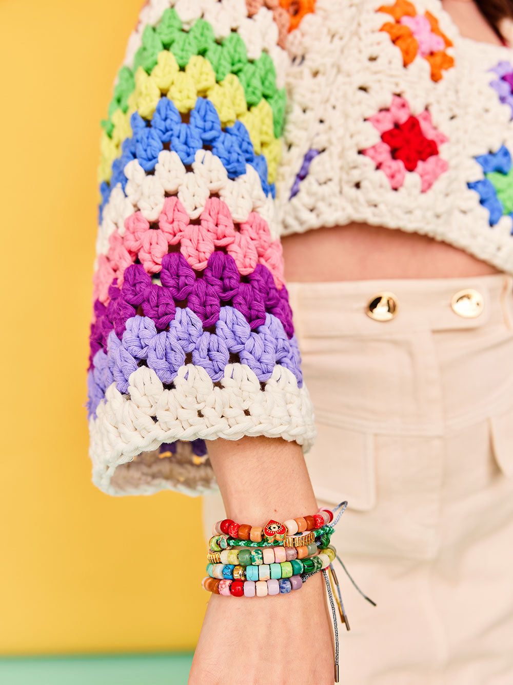 Close up detail of granny stripe crocheted sleeves,